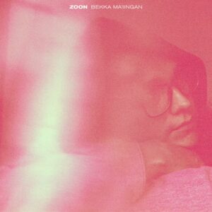 Primarily coral-pink with headshot of Bekka Ma'iingan in the background.