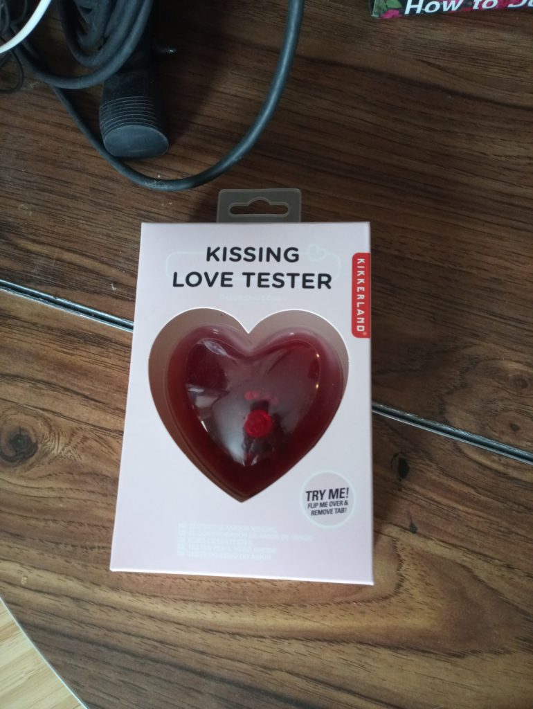 kissing love tester in package